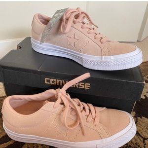 Light pink platform converse.